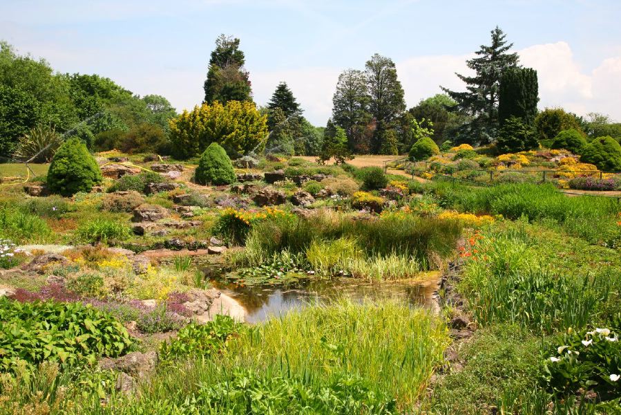 Topiary gardens, rose gardens, formal gardens and parkland around a Medieval Manor House