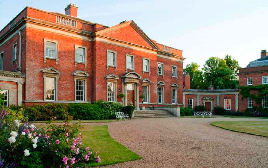Beautiful Georgian red brick country house with a ballroom, great hall, saloon, library and picturesque gardens and farmland