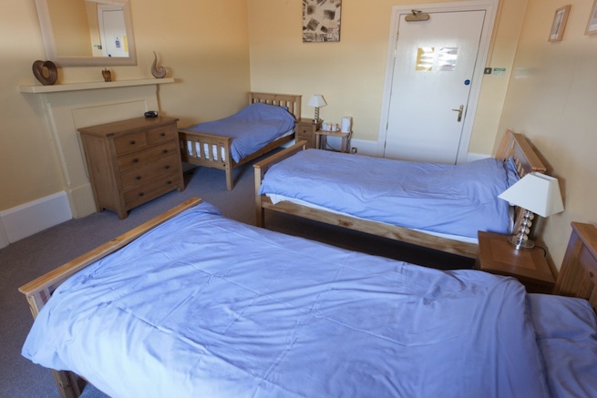 Converted Jacobean house with many bedrooms, 87 beds in total.
