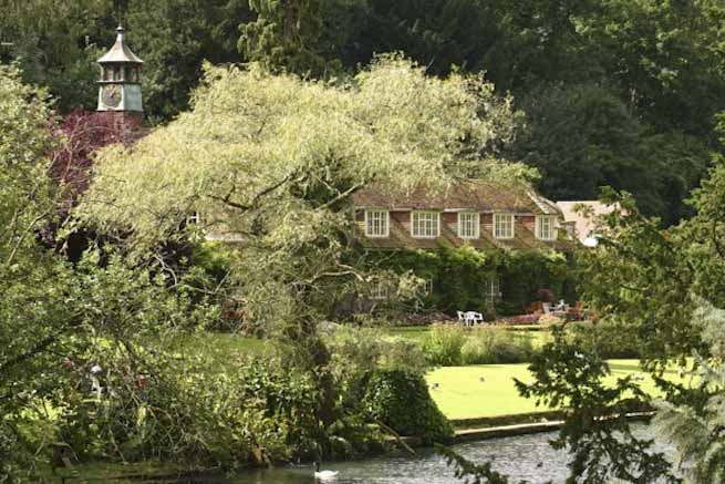 Heritage garden in large country estate featuring a Doric temple, Gothic boathouse, lakes and caves.
