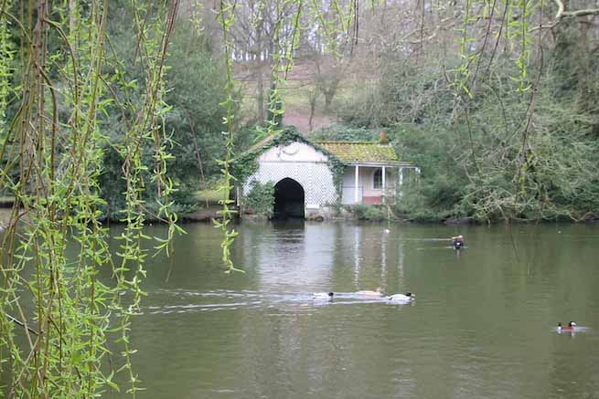 Heritage garden in large country estate featuring a Doric temple, Gothic boathouse, lakes and caves.