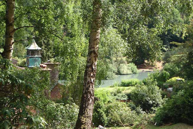 Heritage garden in large country estate featuring a Doric temple, Gothic boathouse, lakes and caves.