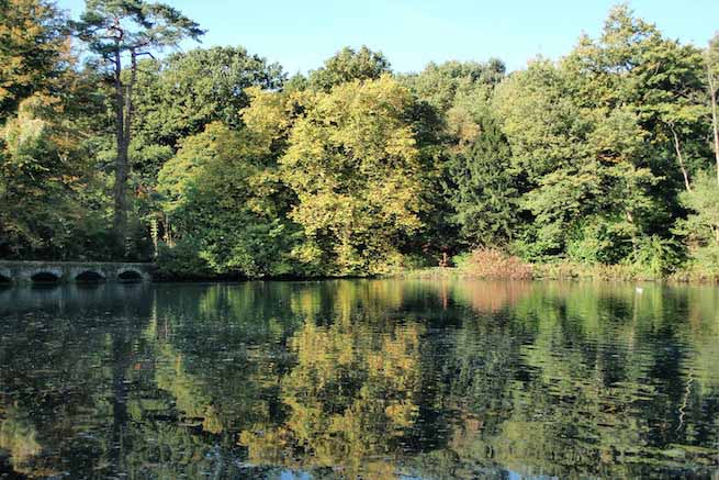 Heritage garden in large country estate featuring a Doric temple, Gothic boathouse, lakes and caves.