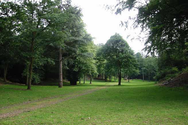 Heritage garden in large country estate featuring a Doric temple, Gothic boathouse, lakes and caves.