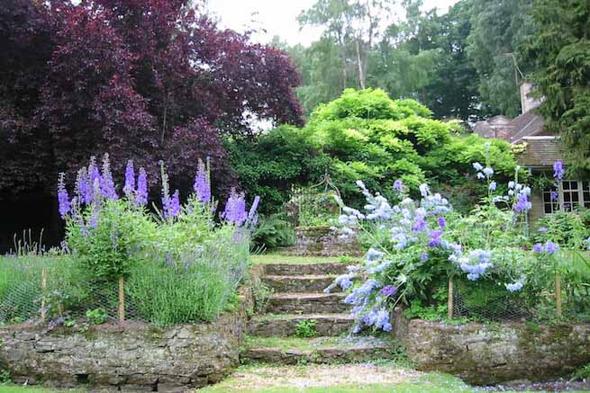 Heritage garden in large country estate featuring a Doric temple, Gothic boathouse, lakes and caves.