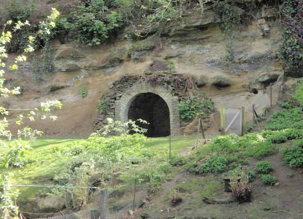 Heritage garden in large country estate featuring a Doric temple, Gothic boathouse, lakes and caves.