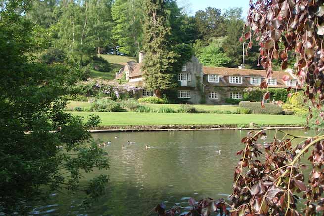 Heritage garden in large country estate featuring a Doric temple, Gothic boathouse, lakes and caves.