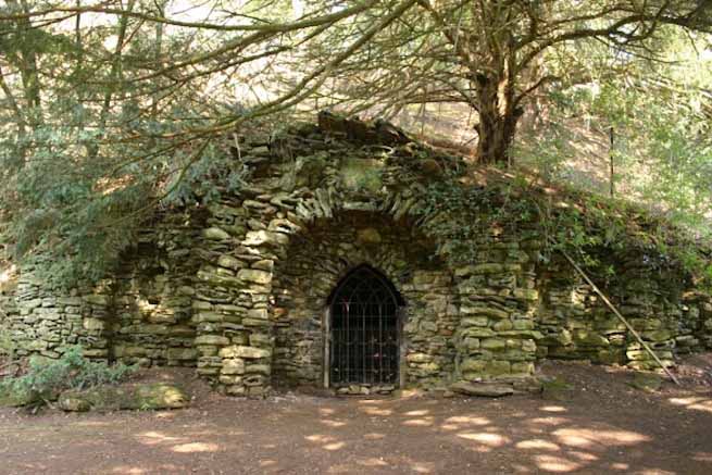 Heritage garden in large country estate featuring a Doric temple, Gothic boathouse, lakes and caves.