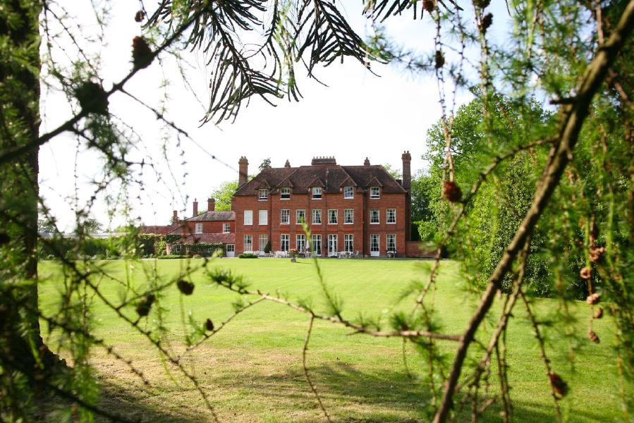 Lovely country house garden looking over a ha-ha at the surrounding countryside, within about 1 hour of Central London and easily accessible by the M4 or M40