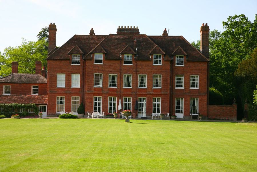 Lovely country house garden looking over a ha-ha at the surrounding countryside, within about 1 hour of Central London and easily accessible by the M4 or M40
