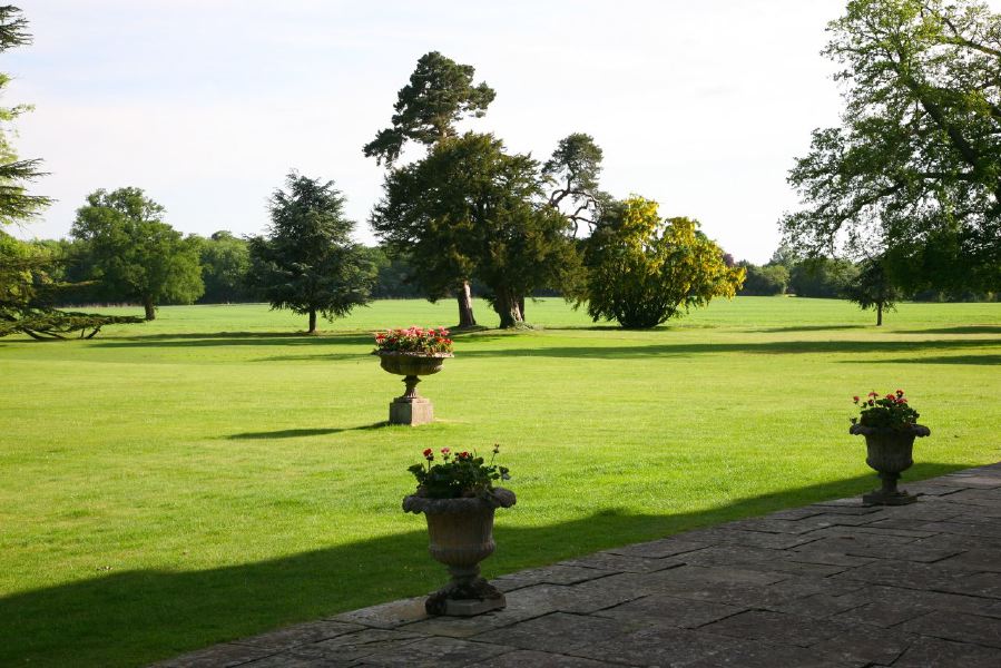 Lovely country house garden looking over a ha-ha at the surrounding countryside, within about 1 hour of Central London and easily accessible by the M4 or M40