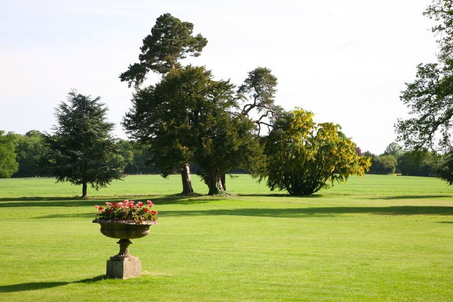Lovely country house garden looking over a ha-ha at the surrounding countryside, within about 1 hour of Central London and easily accessible by the M4 or M40