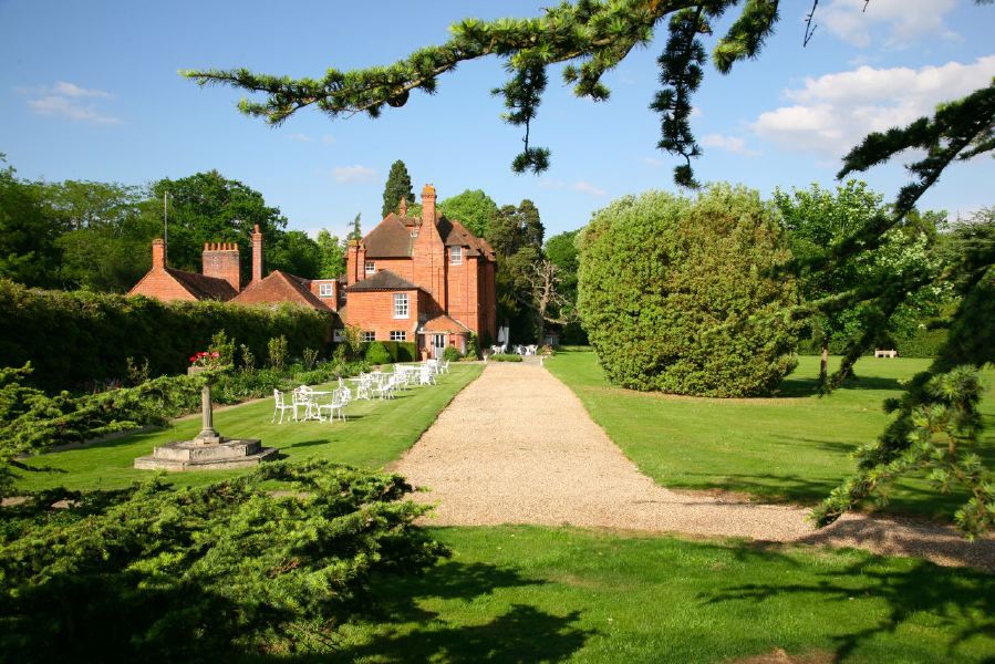 Lovely country house garden looking over a ha-ha at the surrounding countryside, within about 1 hour of Central London and easily accessible by the M4 or M40
