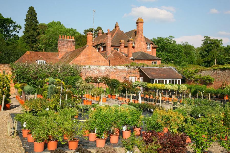 Lovely country house garden looking over a ha-ha at the surrounding countryside, within about 1 hour of Central London and easily accessible by the M4 or M40