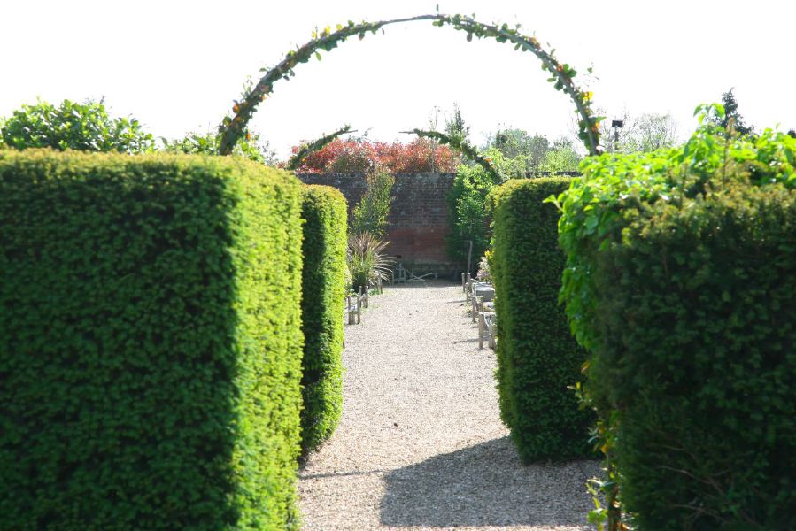Lovely country house garden looking over a ha-ha at the surrounding countryside, within about 1 hour of Central London and easily accessible by the M4 or M40