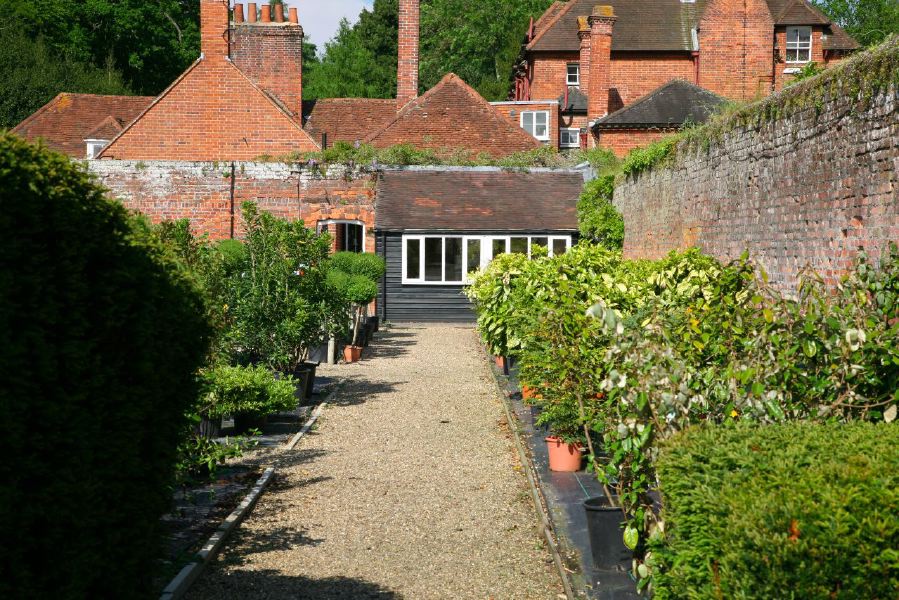Lovely country house garden looking over a ha-ha at the surrounding countryside, within about 1 hour of Central London and easily accessible by the M4 or M40