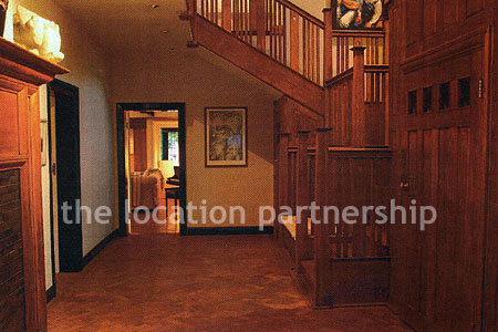 A very large country style house with three reception rooms, eight bedrooms and 1.2 acres of south facing garden