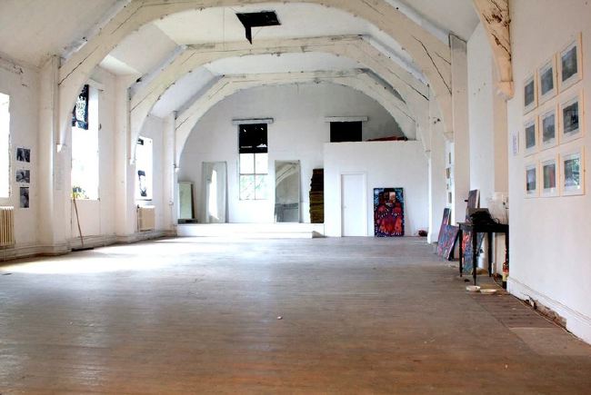Semi derelict Victorian Gothic Mansion with a real urban edge. It has a functioning recording studio and gallery space.