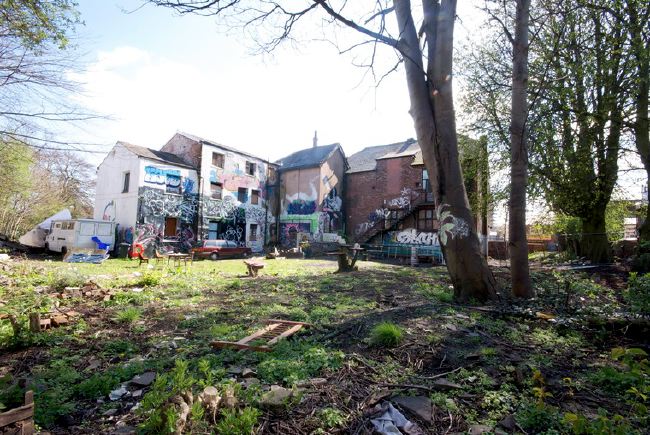 Semi derelict Victorian Gothic Mansion with a real urban edge. It has a functioning recording studio and gallery space.