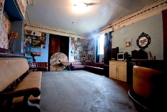 Semi derelict Victorian Gothic Mansion with a real urban edge. It has a functioning recording studio and gallery space.
