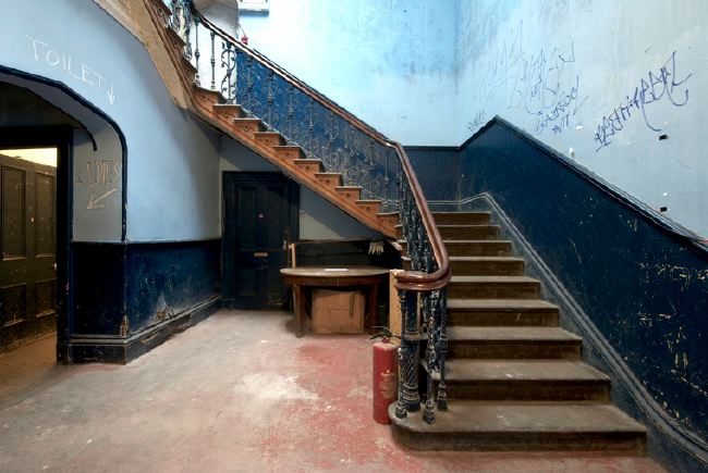 Semi derelict Victorian Gothic Mansion with a real urban edge. It has a functioning recording studio and gallery space.