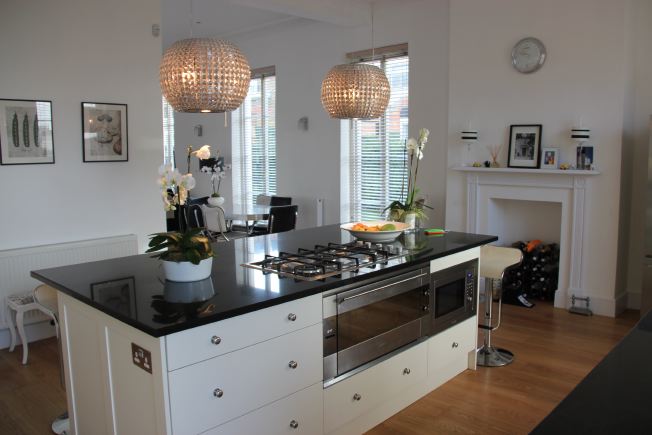 Large modern designer kitchen - very light and airy and open plan. NB- stills or small shoots preferred.