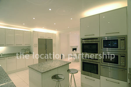 A bright, modern kitchen within a large Victorian property.