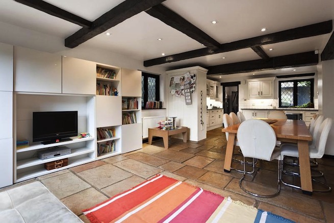 Open plan kitchen and dining area in architecturally designed house.