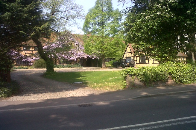 Large architect designed family home with original floor to ceiling log fireplace and 16th century beams. Backs onto woodland.