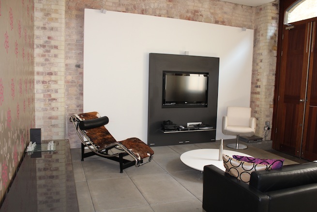 Contemporary open plan home with gorgeous courtyard and modern furnishings.