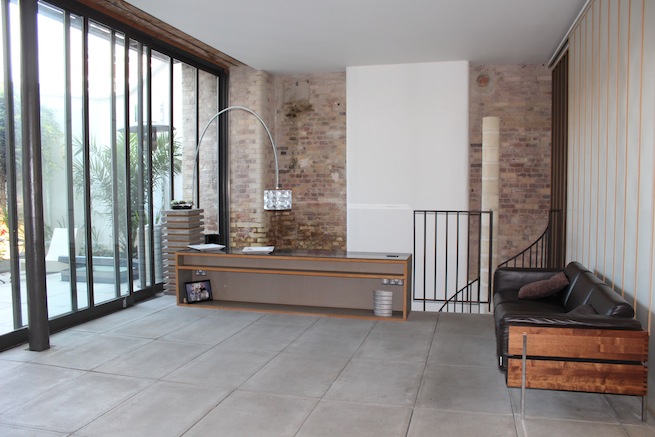 Contemporary open plan home with gorgeous courtyard and modern furnishings.