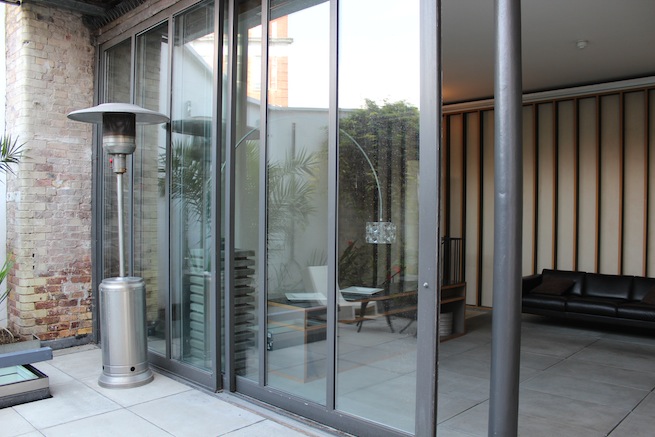 Contemporary open plan home with gorgeous courtyard and modern furnishings.