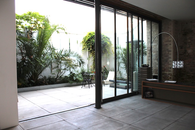 Contemporary open plan home with gorgeous courtyard and modern furnishings.