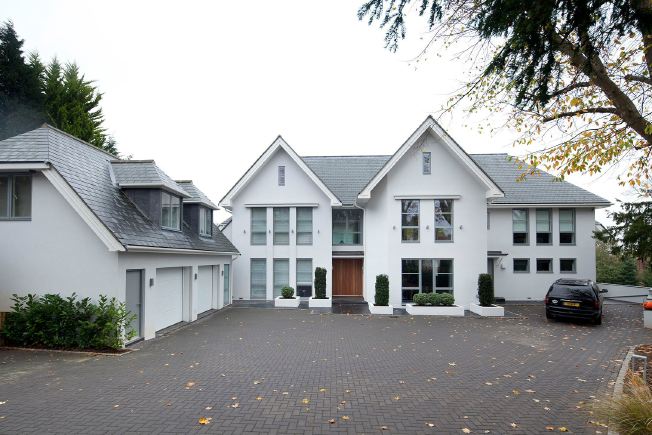 Large Detached, Contemporary home with 6 bedrooms, open plan kitchen, separate formal dining room and sitting room. Indoor swimming pool and gym.