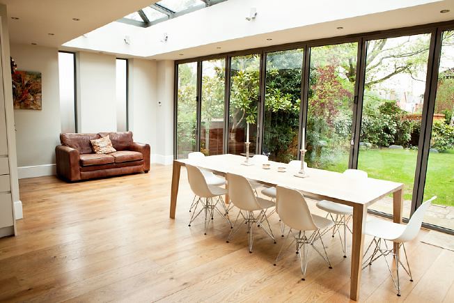 Lovely, light clean lined kitchen with bi-folding doors opening onto the garden.