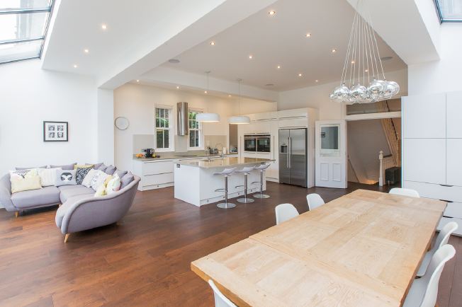Light and airy, spacious kitchen approx 26ft x 24ft with an island, breakfast bar and big sliding doors to the rear garden.