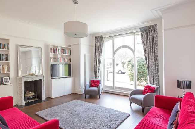 Bright, white and light reception rooms in modernised Victorian house.