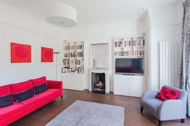 Bright, white and light reception rooms in modernised Victorian house.