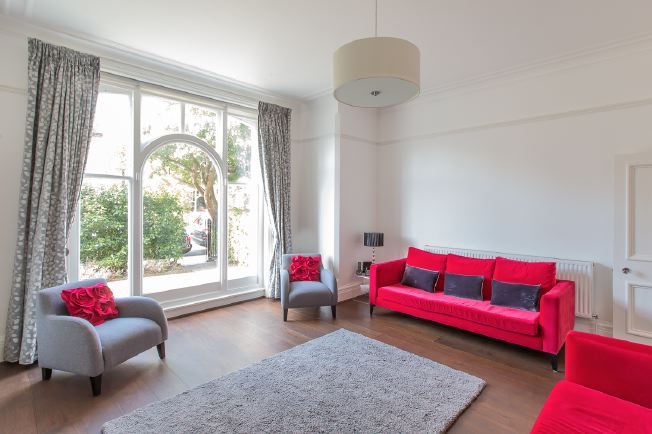 Bright, white and light reception rooms in modernised Victorian house.