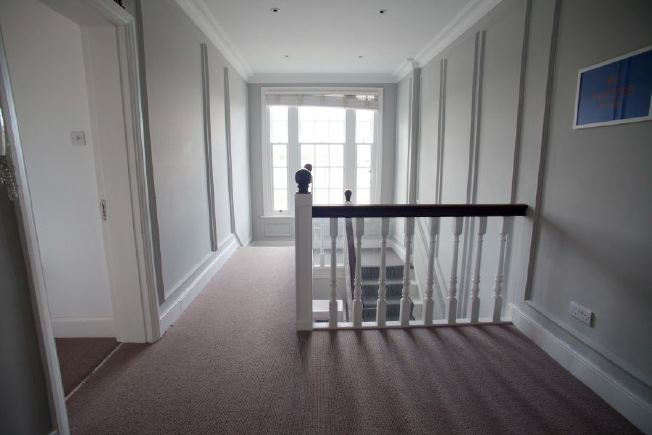 Spacious hallway / landing in large family house.