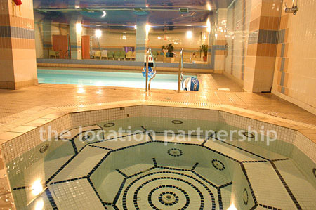 Shoot friendly swimming pool and jacuzzi on basement level.