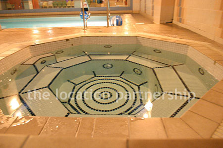 Shoot friendly swimming pool and jacuzzi on basement level.