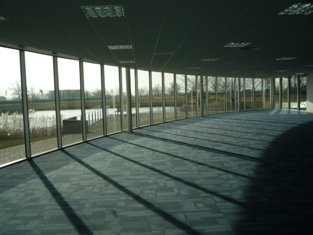 Contemporary, well situated office building overlooking a boardwalk and lake.
