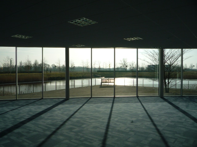 Contemporary, well situated office building overlooking a boardwalk and lake.