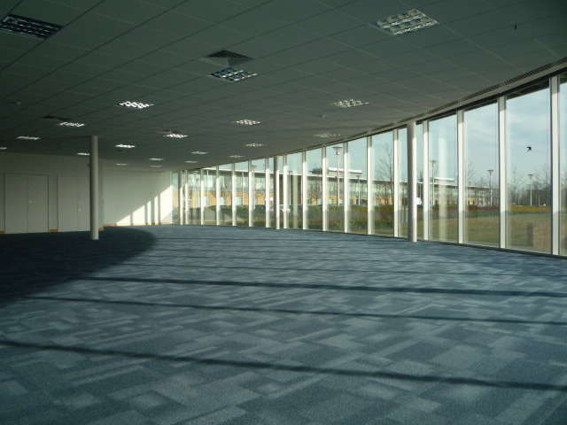 Contemporary, well situated office building overlooking a boardwalk and lake.
