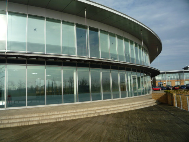 Contemporary, well situated office building overlooking a boardwalk and lake.