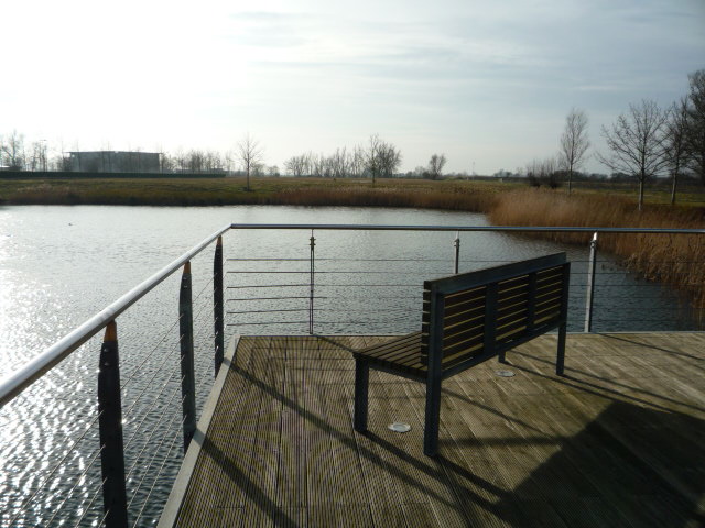 Contemporary, well situated office building overlooking a boardwalk and lake.