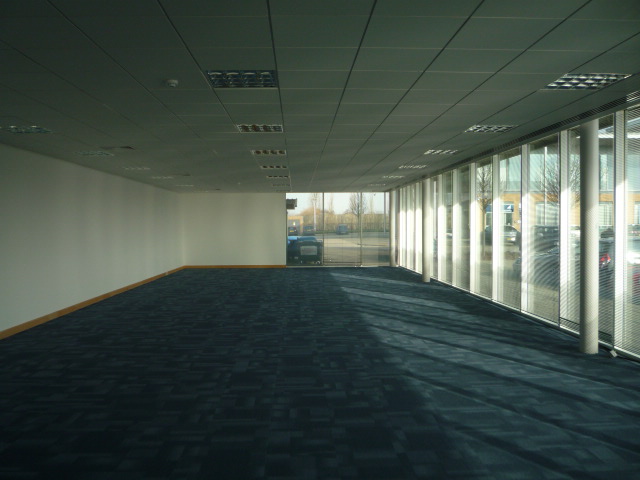 Contemporary, well situated office building overlooking a boardwalk and lake.