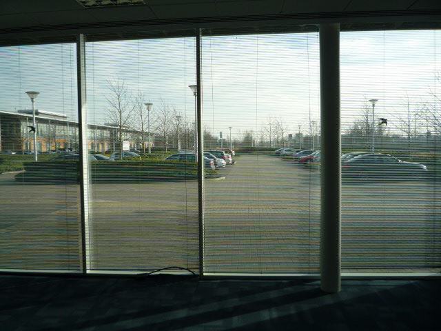 Contemporary, well situated office building overlooking a boardwalk and lake.