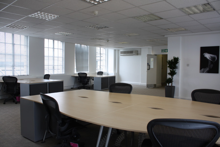 A part furnished empty office space situated on the 6th floor in the West end